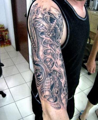 biomechanical tattoo on arm