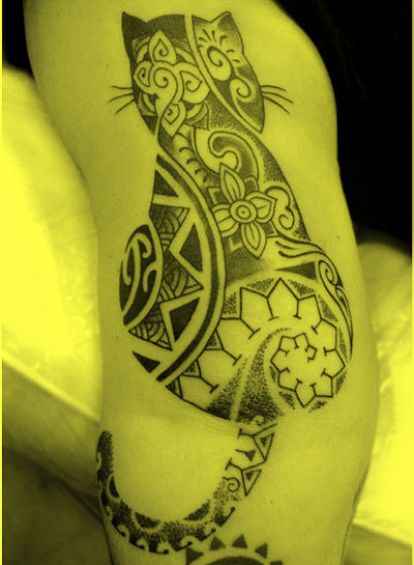 kot tribal tatuaż