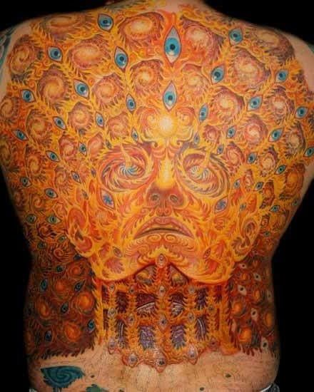 pawie oczko - tatuże na plecach