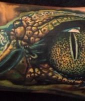 tatuaże z okiem gada