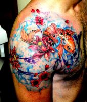 ryby tatuaże na ramieniu