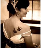 tatuaże damskie na plecach 75526