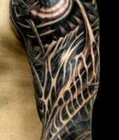 tatuaże biomechaniczne 77393
