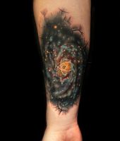 galaktyka tatuaż na ręce