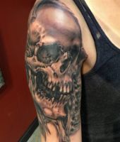 ludzka czaszka tatuaże na ramieniu