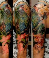 ptak wśród kwiatów, kolorowe tatuaże