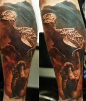 szkielet ptaka i dłoń kolorowe tatuaże