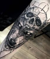 głowa wilka i czaszka