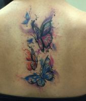 małe motylki na plecach