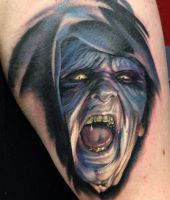 demon twarz tatuaż