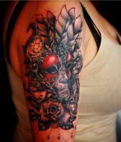 tatuaż na ramieniu dla kobiety