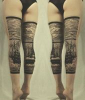 statek wzory tatuaży na nogach