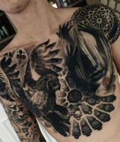 sowa i twarz kobiety niesamowite tatuaże