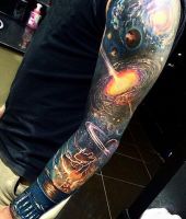 kosmos tatuaże zrobione na ręce
