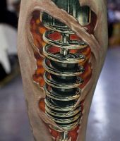 tatuaż na łydce amortyzator