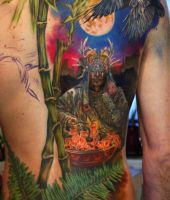 szaman tatuaż na plecach