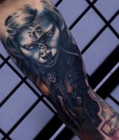 mroczne tatuaże z twrzą kobiety