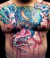 demon tattoo on his chest