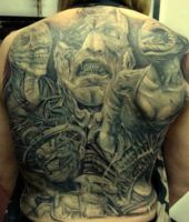 demony tatuaże na plecach