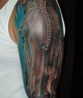 głowa konia tatuaż na ręce