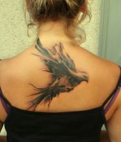 gołębica tatuaż na plecach