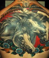 konie tatuaże na plecach