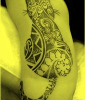 kot tribal tatuaż