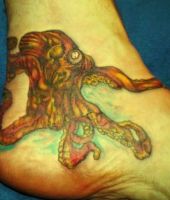 ośmiorniczka tatuaż na kostce