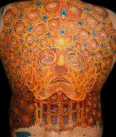 pawie oczko - tatuże na plecach