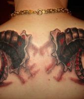 rogi barana tatuaże na plecach