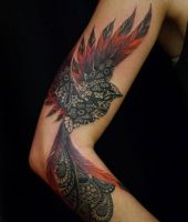 tatuaże ptaki na ręce