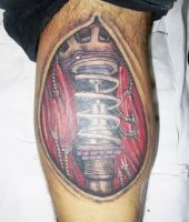 tatuaż na łydce amortyzator