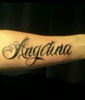 tatuaż napis na ręce